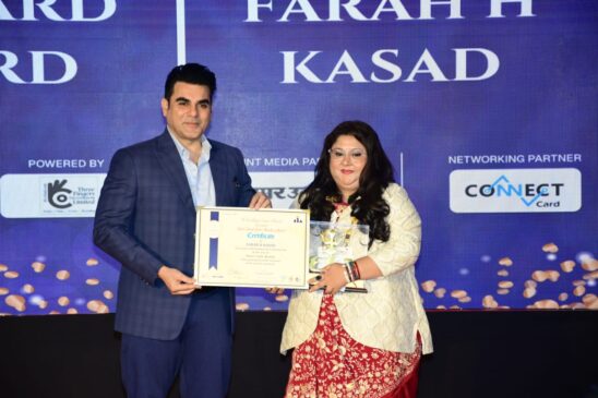 Farah Kasad with celebrity guest Arbaaz Khan receiving an award 